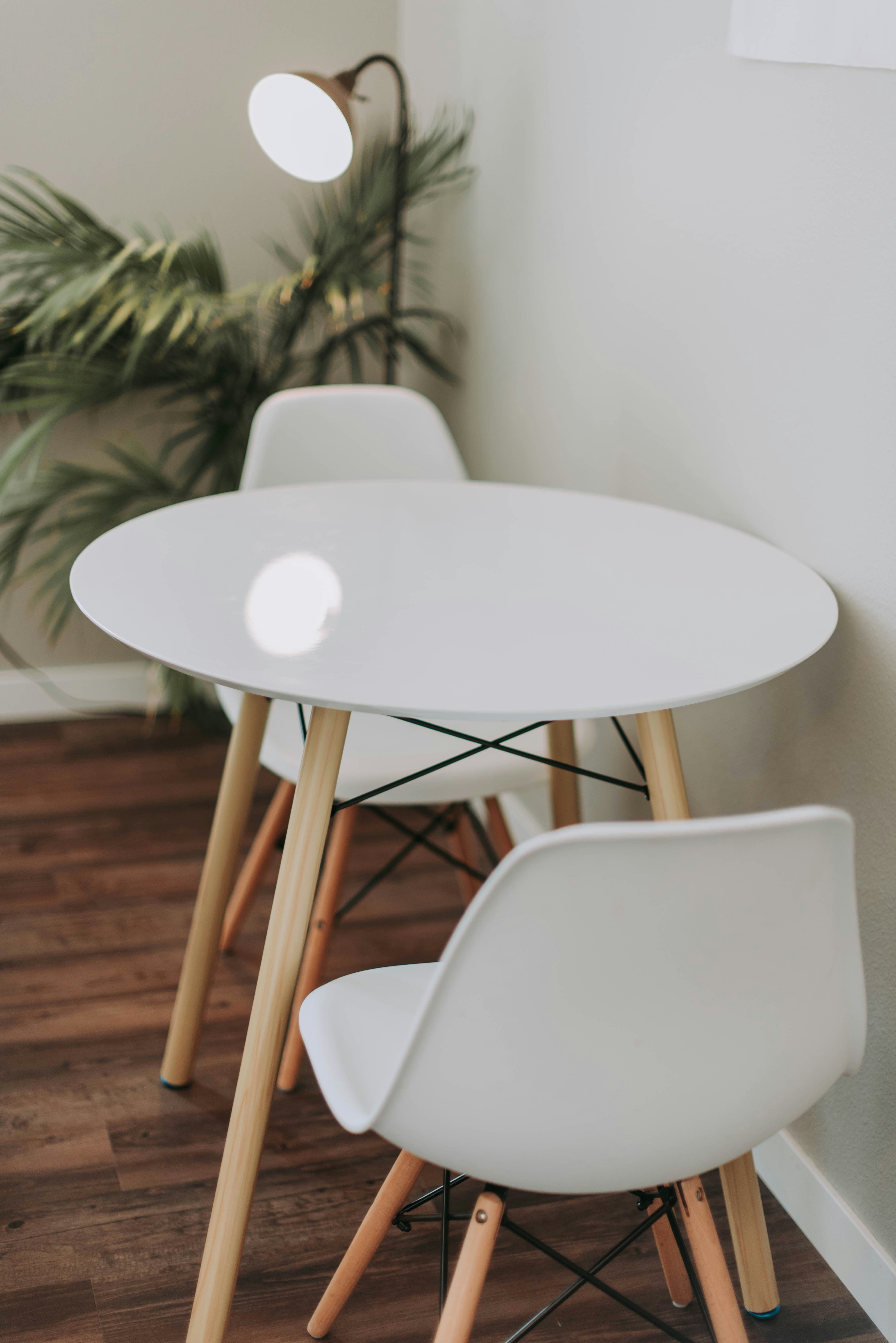 White table with two white chairs