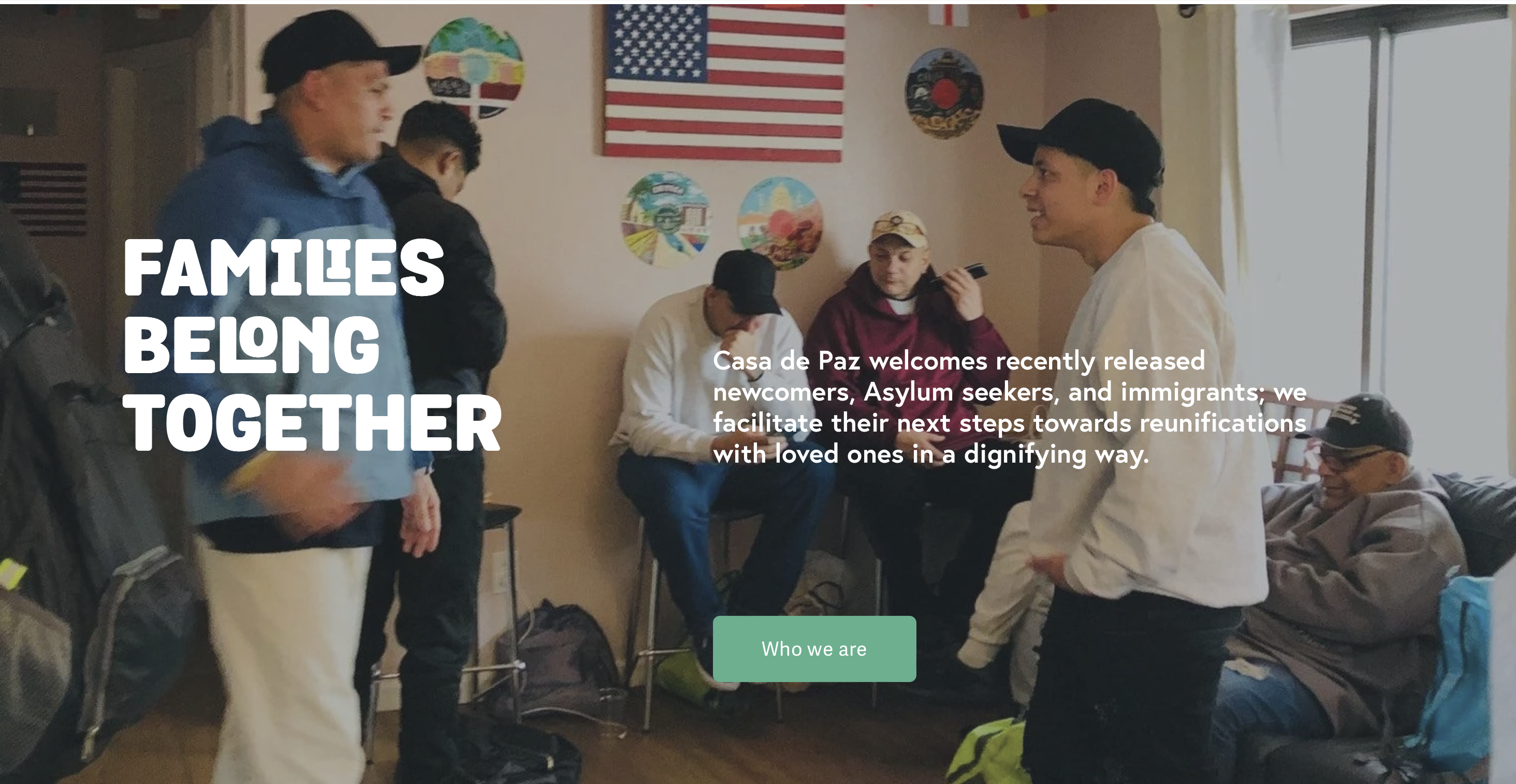 Two men talking in a meeting hall
