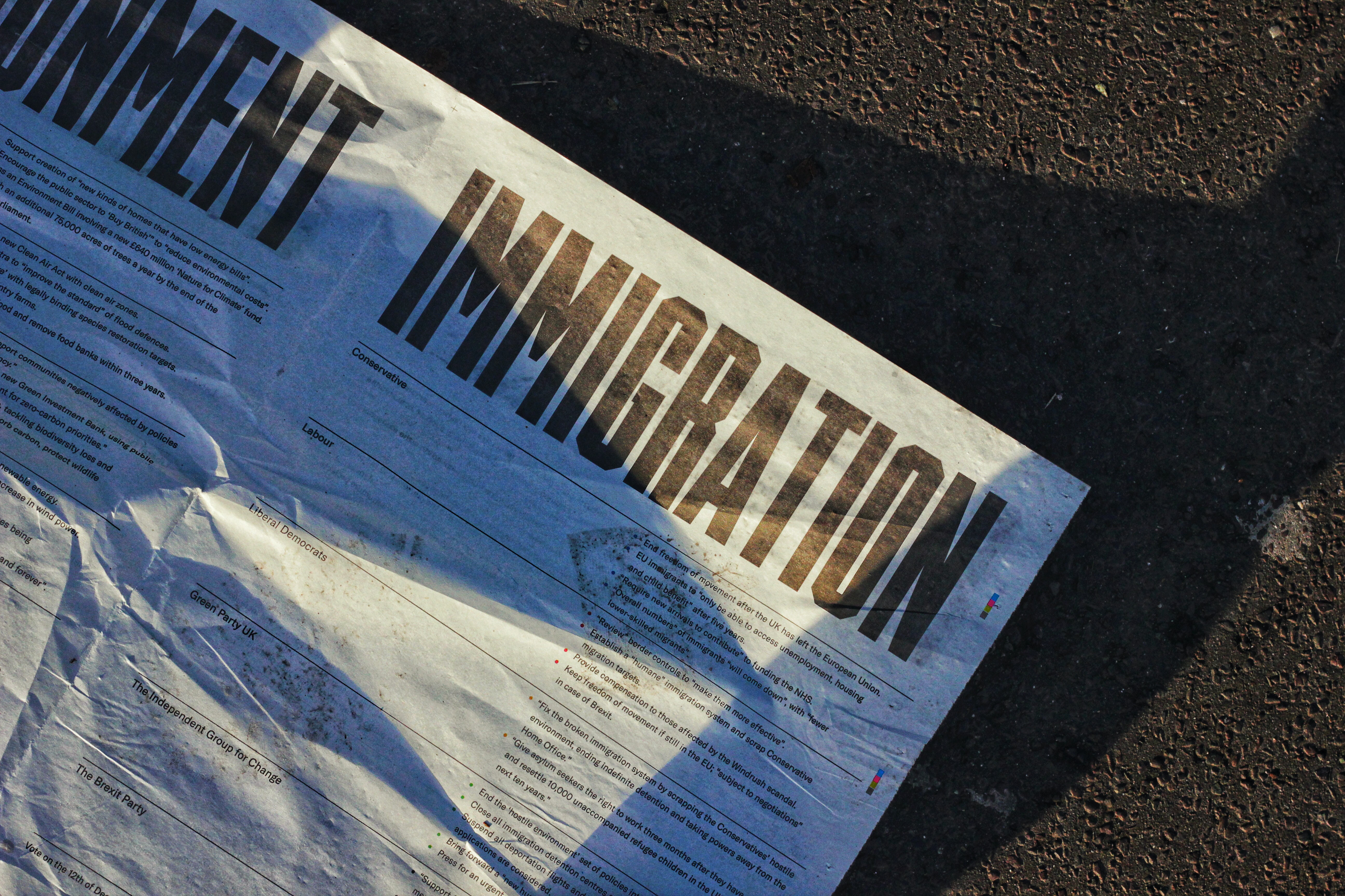 Newspaper with headline "Immigration"