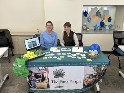 Posed photo at a tabling event for The Park People