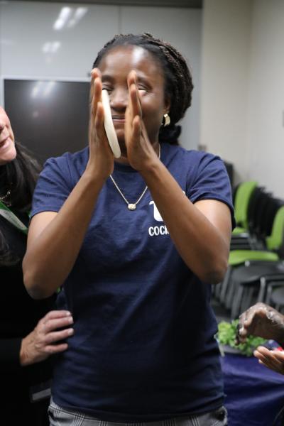 Photo of intern mid-clap