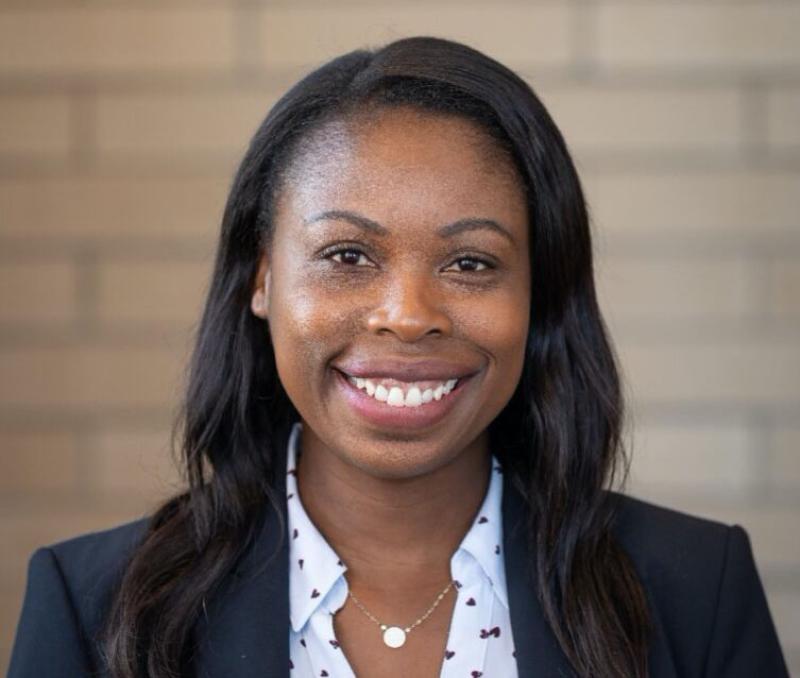 soman smiling at camera