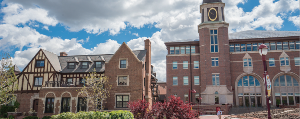 Sturm Law building with students on lawn