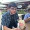 Gabe: a man eating a big bowl of ice cream looking at camera