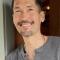 Mark: a smiling man