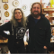charlie: a bearded man with a smile standing with woman