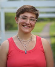 Rhianna Lewis smiles at the camera