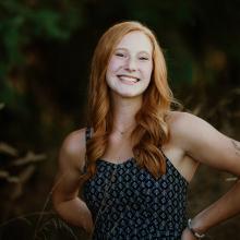 Addy Braun smiles at camera
