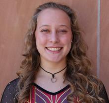 Sydney Gainforth smiles at camera