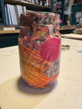 object paper mached with collage of patterns and colors