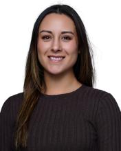 Vivien Enriquez smiles at camera