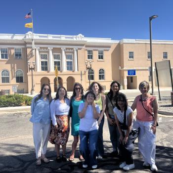 group of people in front of courthouse
