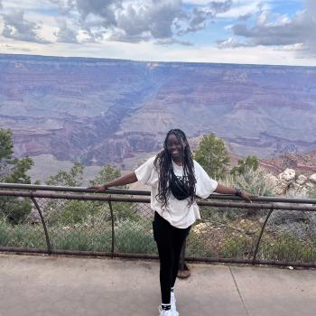 image of women posing in front of a canyon