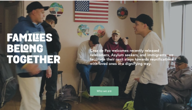 Two men talking in a meeting hall