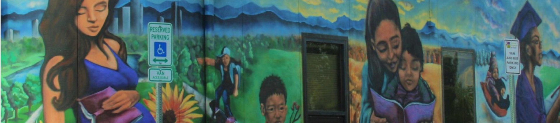 mural of mothers with their children among sunflowers